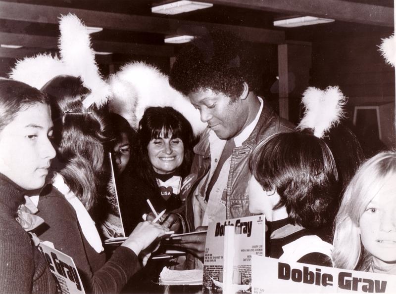 19.jpg - Signing autographs after a show